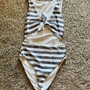 Grey and white striped one piece swim suit